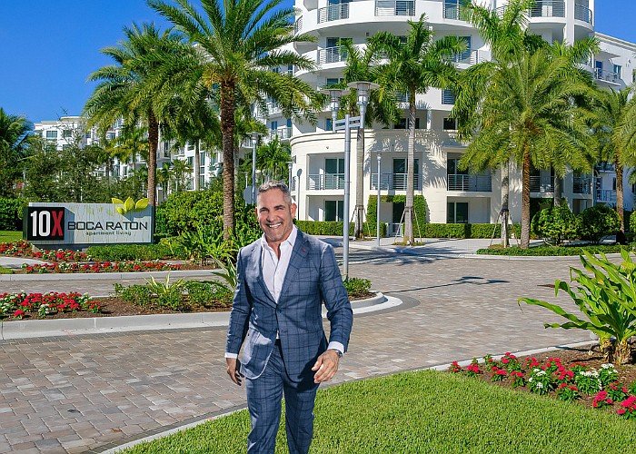 Grant Cardone walking near a 10X property